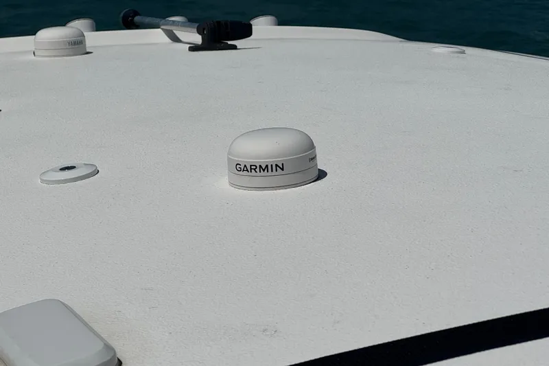 Slide: The Image of Garmin device on 2023 Sea Hunt Gamefish 27 Forward Seating boat deck. - 12