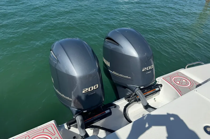 Slide: The Image of Twin Yamaha 200 outboard engines on a 2023 Sea Hunt Gamefish 27 boat. - 14