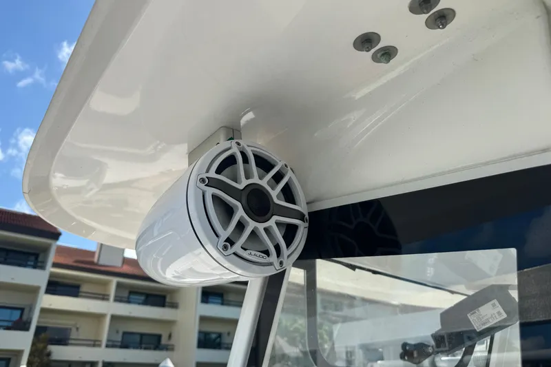 Slide: The Image of Speaker system on a 2023 Sea Hunt Gamefish 27 boat, mounted under the canopy. - 19