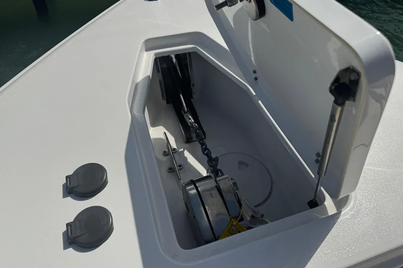 Slide: The Image of Anchor storage compartment on 2023 Sea Hunt Gamefish 27 Forward Seating boat. - 20