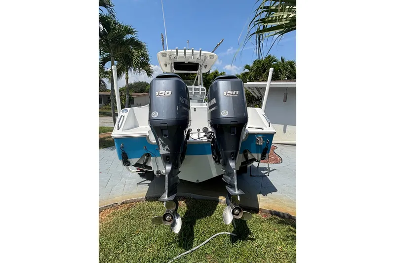 Slide: The Image of 2011 Sea Hunt Gamefish 25 boat with dual Yamaha 150 outboard motors. - 9