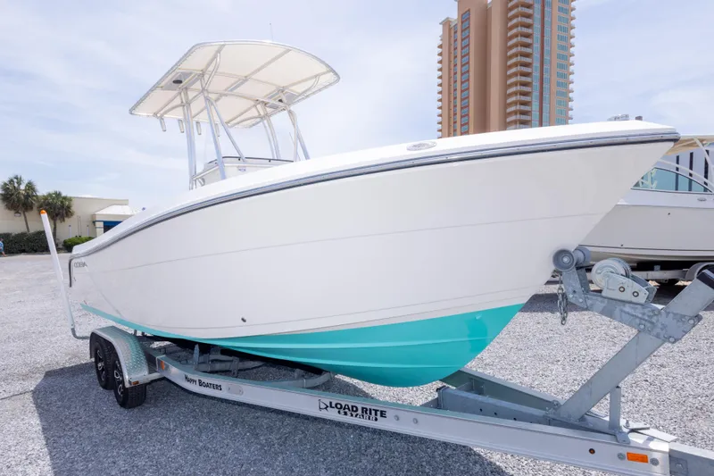 Slide: The Image of Group at boat sales booth promoting Cobia 237 Center Console, 2022 model. - 7