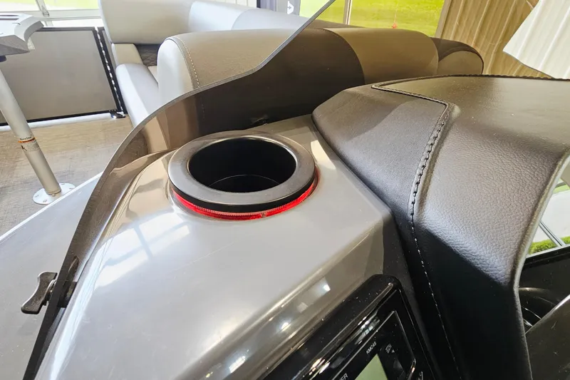 Slide: The Image of Interior of 2024 Bennington 22 S Swingback boat featuring a sleek cup holder design. - 16