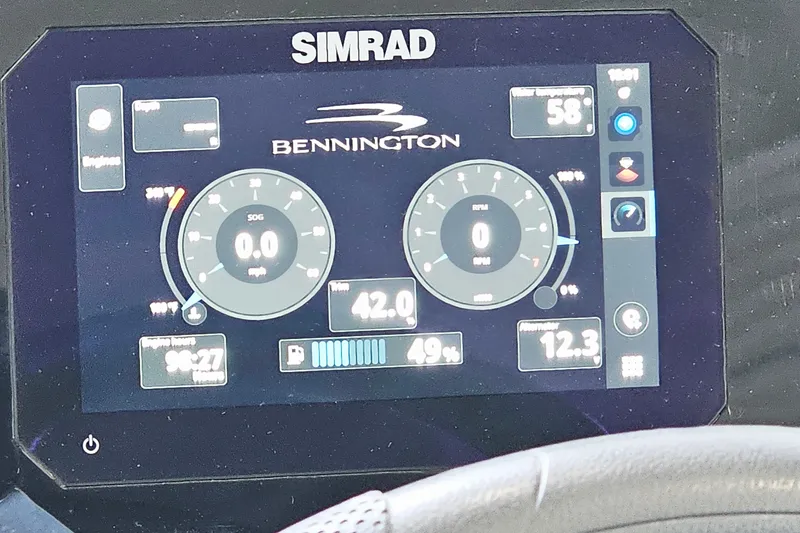 Slide: The Image of Simrad display on 2024 Bennington 22 S Swingback showing speed, RPM, and engine data. - 18