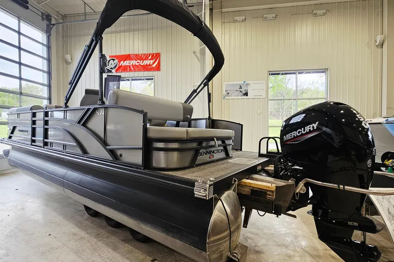 Slide: The Image of 2024 Bennington 22 S Swingback pontoon boat with Mercury engine in showroom. - 4
