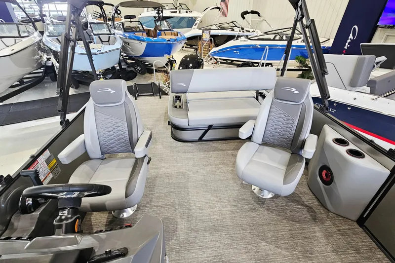 Slide: The Image of Interior of 2024 Bennington 22 S Swingback pontoon boat with modern seating and steering. - 7