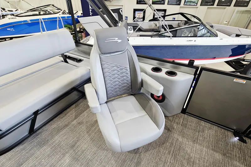 Slide: The Image of 2024 Bennington 22 S Swingback boat interior with plush seating and modern design. - 9