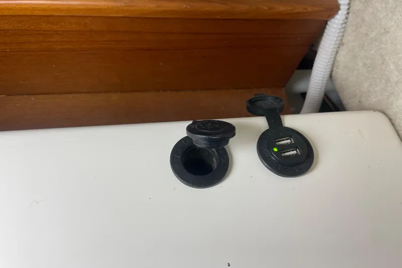 Slide: The Image of Dual USB charging ports on a Precision 23 boat, model year 2001. - 18