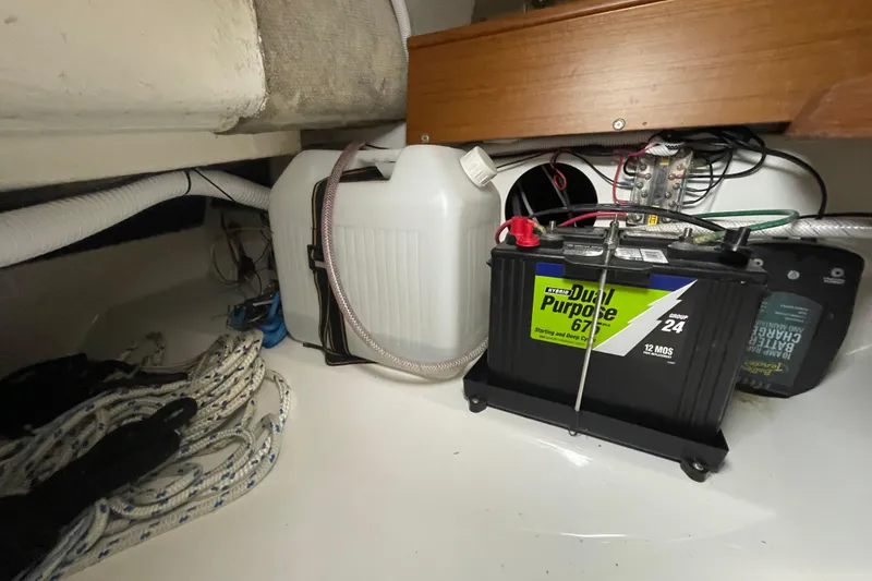 Slide: The Image of Battery and equipment storage area in a 2001 Precision 23 boat. - 26