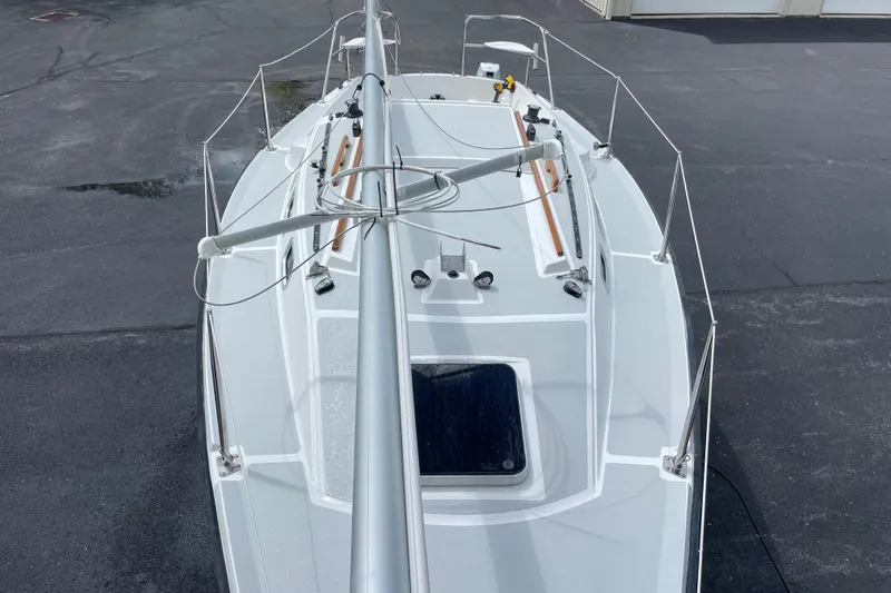Slide: The Image of Sailboat deck view of a 2001 Precision 23 model, showcasing sleek design and rigging. - 37
