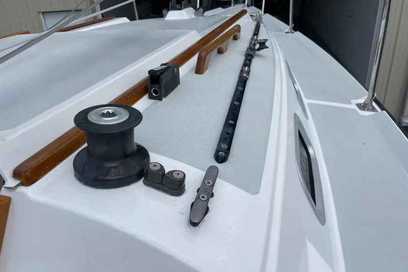 Slide: The Image of Deck of a 2001 Precision 23 sailboat with winch and cleats. - 40