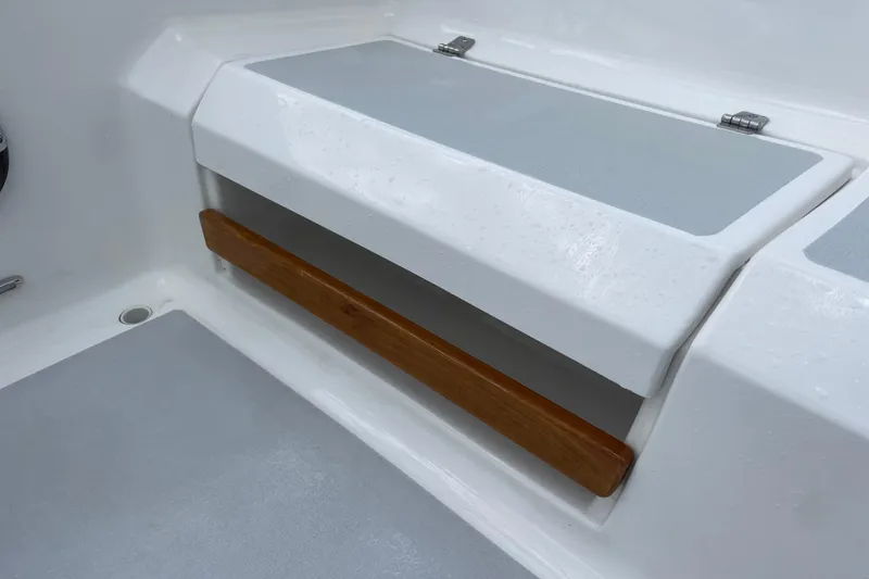 Slide: The Image of White boat interior with wooden handle, Precision 23 model, 2001. - 42