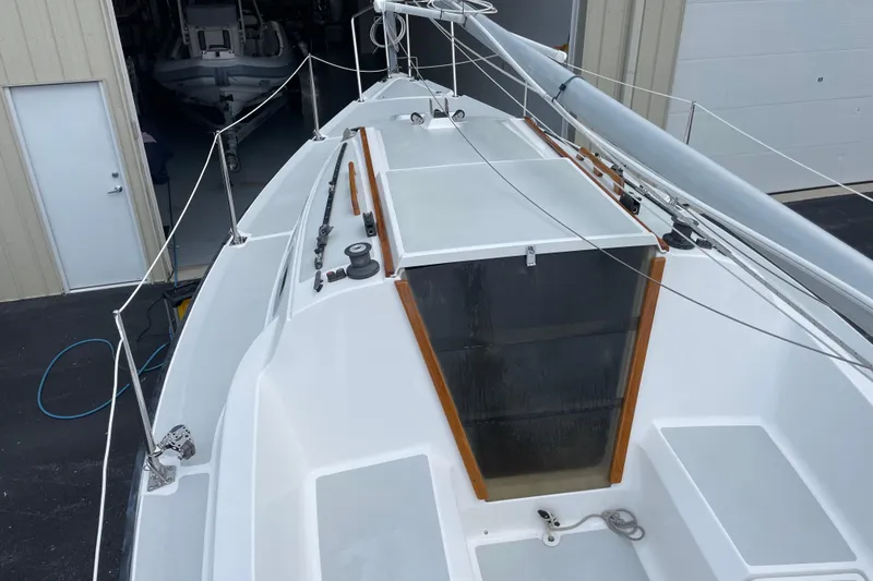 Slide: The Image of Sailboat deck view of 2001 Precision 23, docked near a storage facility. - 45