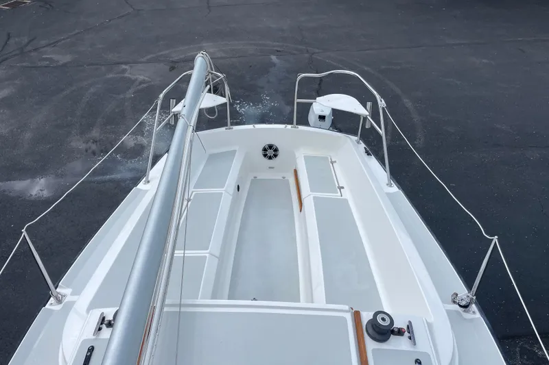 Slide: The Image of Top view of a 2001 Precision 23 sailboat deck, showcasing clean design and rigging. - 46