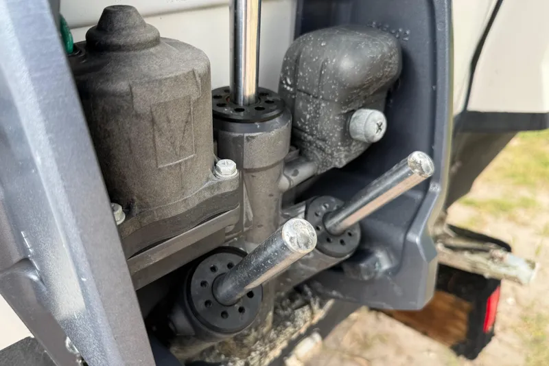 Slide: The Image of Close-up of 2016 Hurricane SunDeck Sport 203 OB engine components. - 6