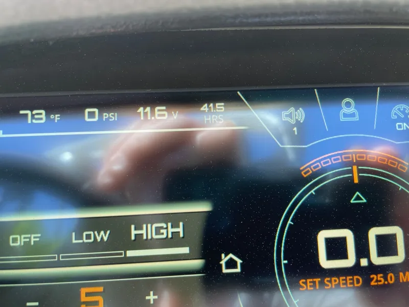 Slide: The Image of Nautique G23 2020 dashboard displaying temperature and voltage readings. - 13