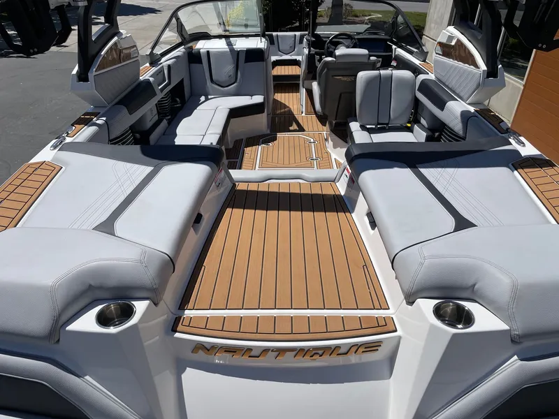 Slide: The Image of Interior of a 2020 Nautique G23 boat with luxurious seating. - 4