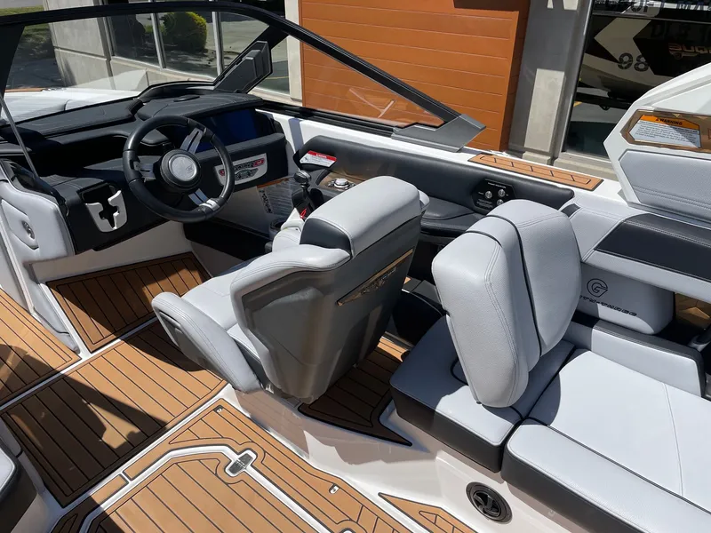 Slide: The Image of Interior of a 2020 Nautique G23 boat with modern seating. - 6