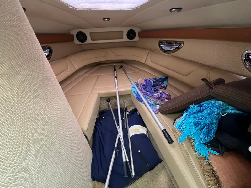 Slide: The Image of Interior of a 2014 Cobalt 243 boat with cushions and accessories. - 17