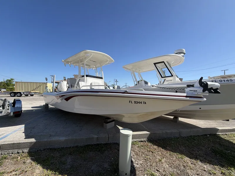The Image of 2023 Ranger 2510 boat parked under clear blue sky. - 1