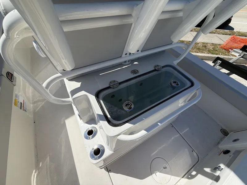 Slide: The Image of 2023 Ranger 2510 boat with integrated storage and cup holders. - 12