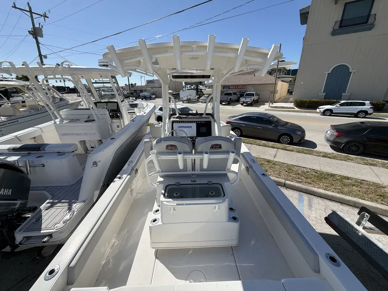 Slide: The Image of 2023 Ranger 2510 boat on a parking lot, side view. - 20