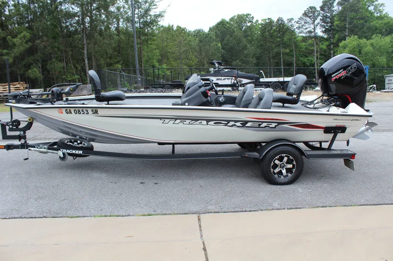 The Image of 2020 Tracker Pro Team 195 TXW TE boat on trailer outdoors. - 1