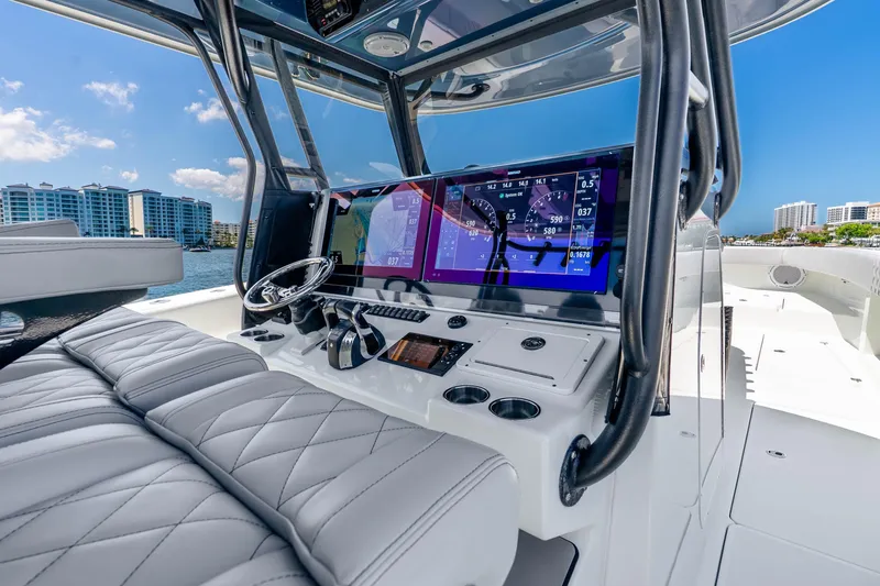 Slide: The Image of 2019 Freeman 42LR boat cockpit with advanced navigation system and luxurious seating. - 20