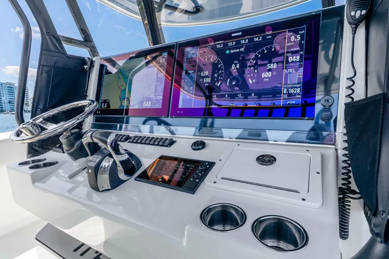 Slide: The Image of Control panel of a 2019 Freeman 42LR boat with advanced navigation displays. - 21