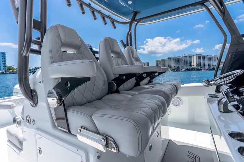Slide: The Image of Luxury seating on a 2019 Freeman 42LR boat, with ocean view and modern design. - 24
