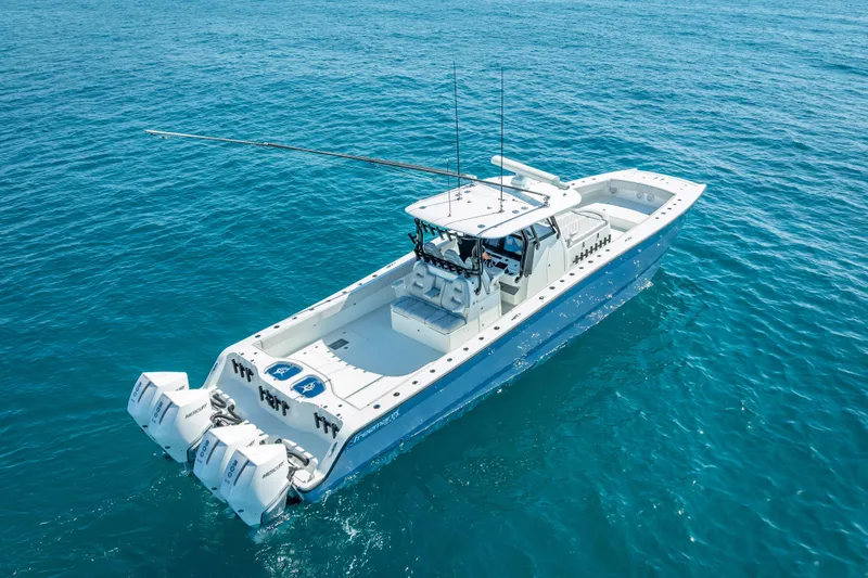 Slide: The Image of 2019 Freeman 42LR boat cruising on open blue ocean waters. - 3