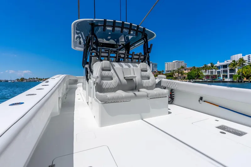 Slide: The Image of Freeman 42LR 2019 boat with luxurious seating, cruising on a sunny day. - 35