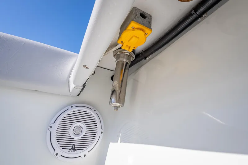 Slide: The Image of Boat interior detail of a 2019 Freeman 42LR, featuring a speaker and metal fixture. - 61