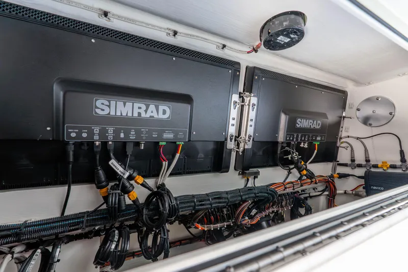 Slide: The Image of Electrical system of a 2019 Freeman 42LR boat featuring Simrad equipment. - 62