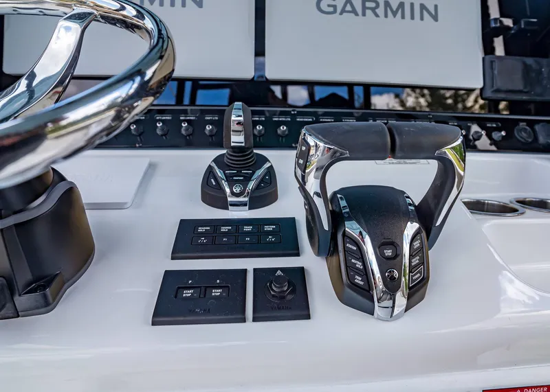Slide: The Image of Control console of Sea Hunt Ultra 285 SE boat, year 2026. - 21