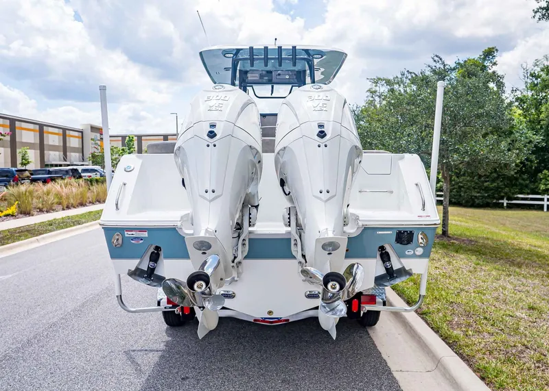 Slide: The Image of Rear view of Sea Hunt Ultra 285 SE boat, model year 2026. - 3