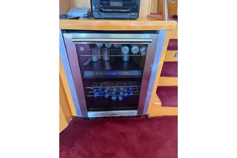 Slide: The Image of Mini fridge stocked with beverages on a 1999 McKinna 57 Pilothouse yacht. - 13