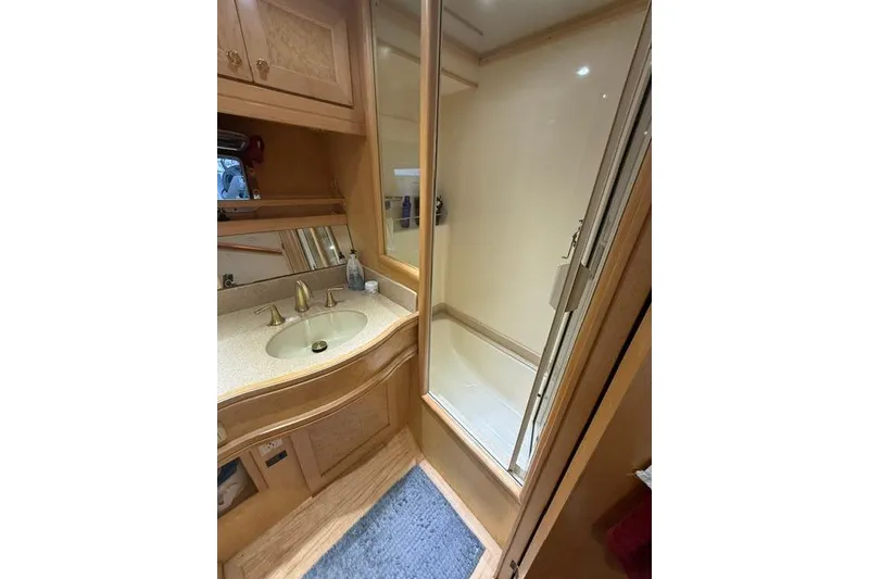 Slide: The Image of Bathroom interior of 1999 McKinna 57 Pilothouse yacht with sink and shower. - 20