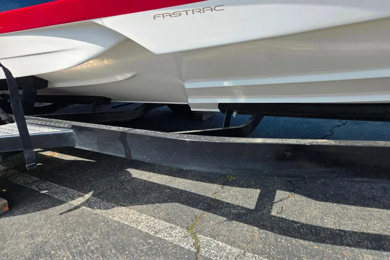 Slide: The Image of 2008 Regal 1900 Bowrider boat on trailer, showcasing hull and FasTrac design. - 3