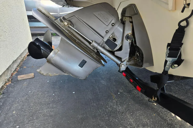 Slide: The Image of 2008 Regal 1900 Bowrider boat engine and propeller detail on trailer. - 4