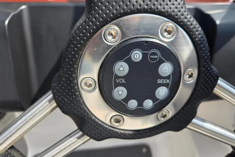 Slide: The Image of Steering wheel control panel on a 2008 Regal 1900 Bowrider boat. - 9