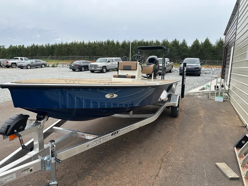 Slide: The Image of 2026 Xpress Skiff on trailer, ready for adventure. - 3