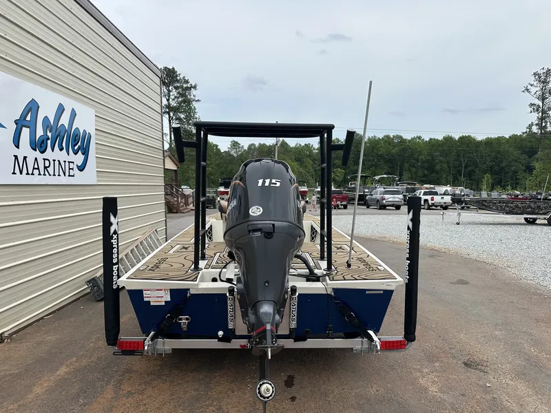 Slide: The Image of 2026 Xpress Skiff with outboard motor at Ashley Marine. - 8