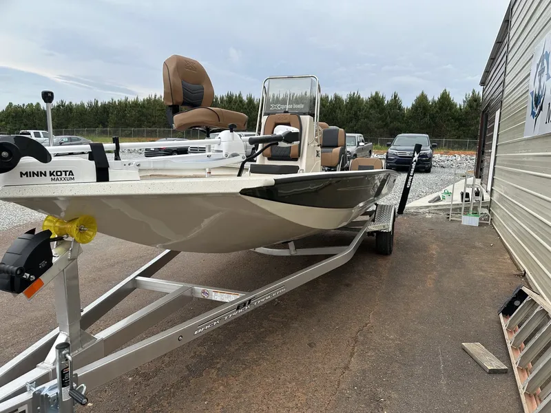 Slide: The Image of 2026 Xpress Hyper-Lift Bay Series boat on trailer, Minn Kota motor. - 3