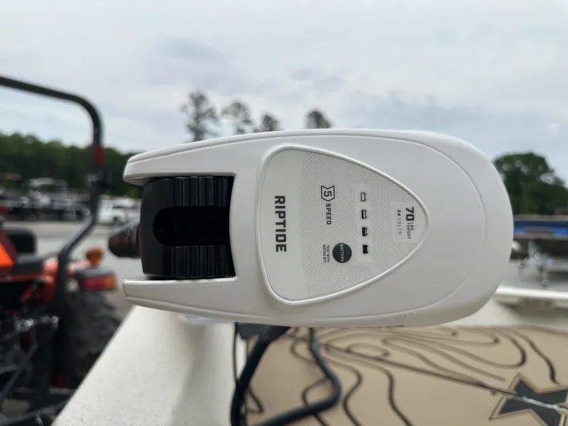 Slide: The Image of Close-up of a Riptide motor on a 2026 Xpress boat. - 4