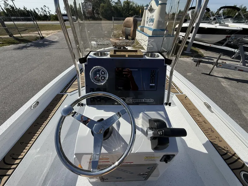 Slide: The Image of Steering console of Xpress Hyper-Lift Bay Series H20B boat, year 2026. - 10