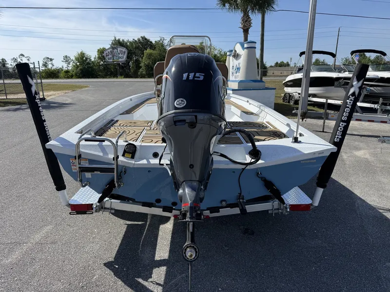 Slide: The Image of 2026 Xpress Hyper-Lift Bay Series H20B boat with outboard motor. - 3