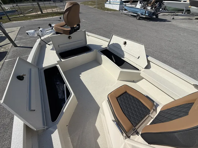 Slide: The Image of 2026 Xpress Hyper-Lift Bay Series H22B with open storage compartments. - 8