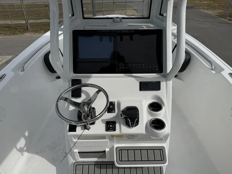 Slide: The Image of Helm console of the 2026 Tidewater 232 CC Adventure. - 11