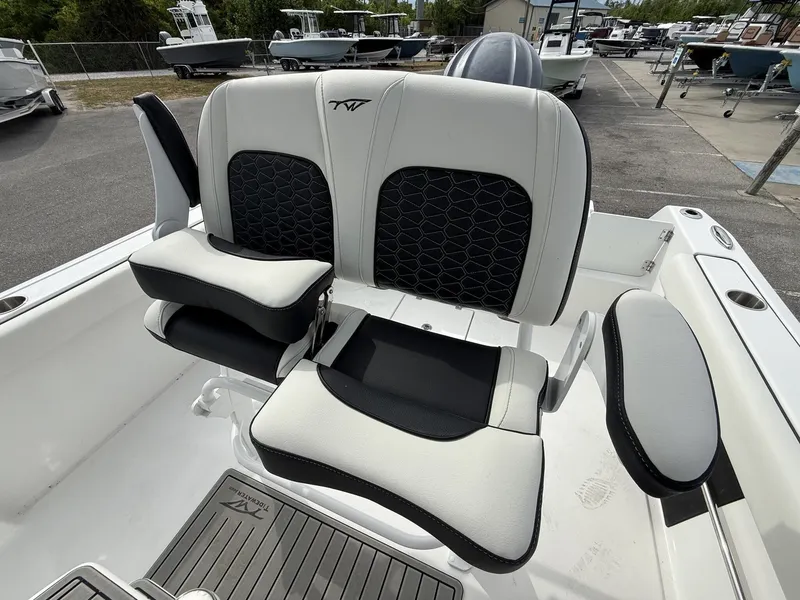 Slide: The Image of 2026 Tidewater 232 CC Adventure boat seat with modern design. - 12